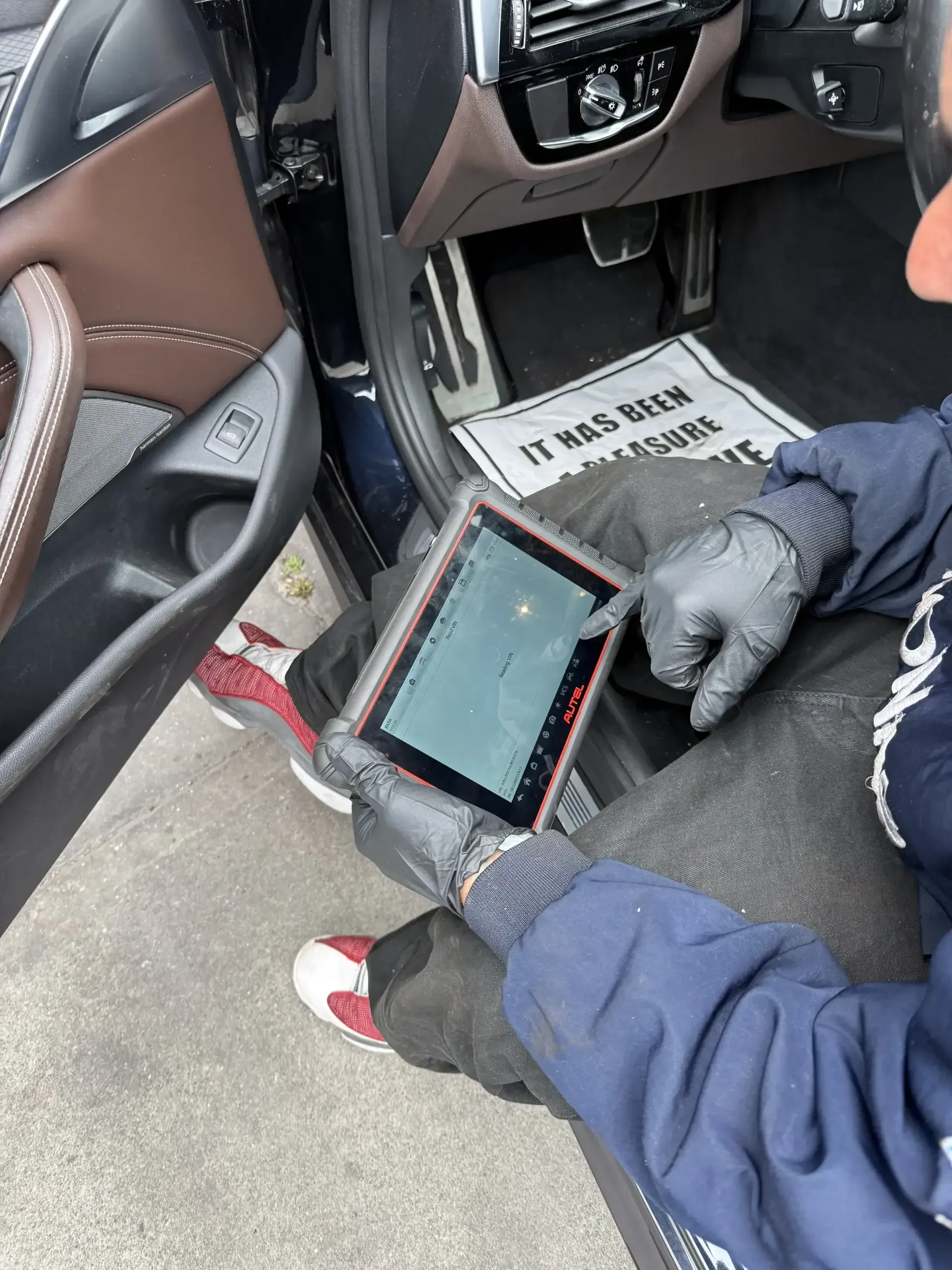 Autel scanner showing live data graph from a BMW M550i (G30 N63 V8) during diagnostic at Beacon Auto Care San Mateo