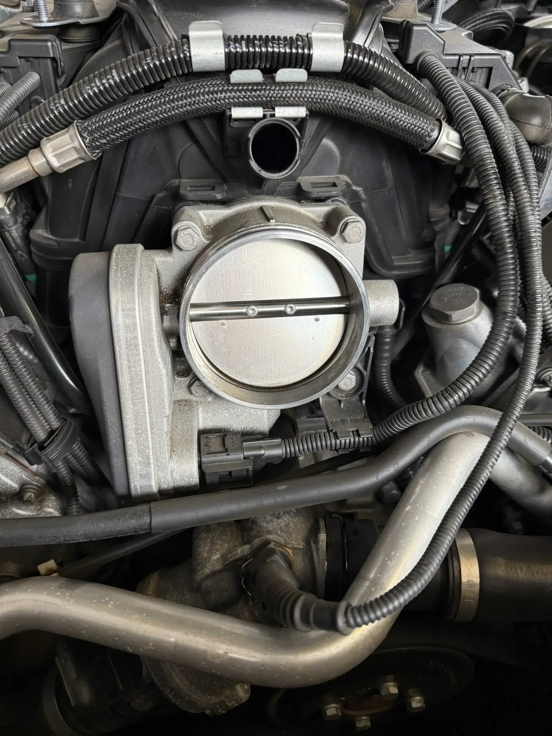 BMW V8 throttle body cleaning with CRC spray cleaner at Beacon Auto Care San Mateo