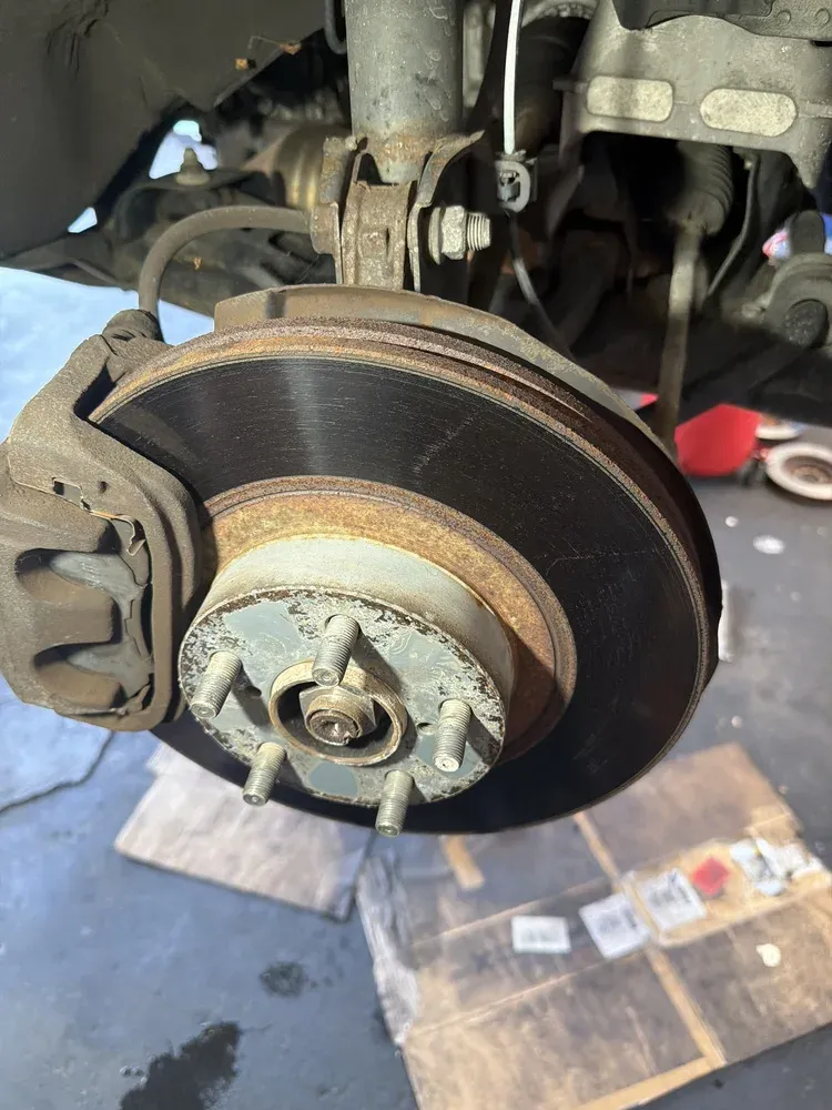 Brake pad friction material thickness measurement at Beacon Auto Care San Mateo