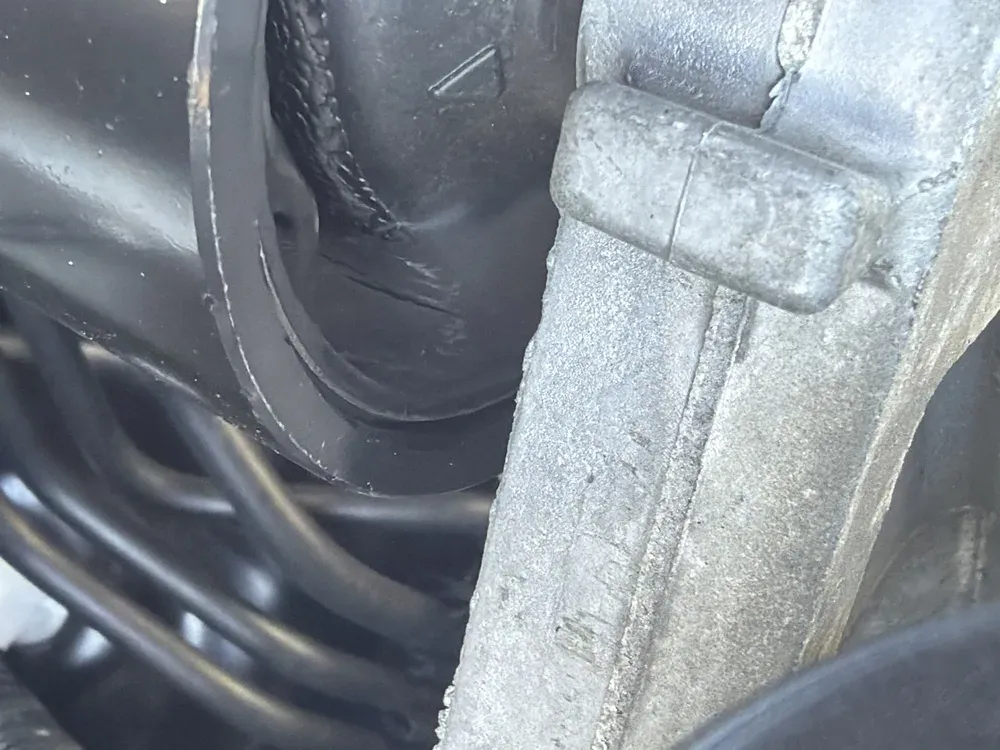 Torn engine motor mount found during engine repair inspection at Beacon Auto Care San Mateo